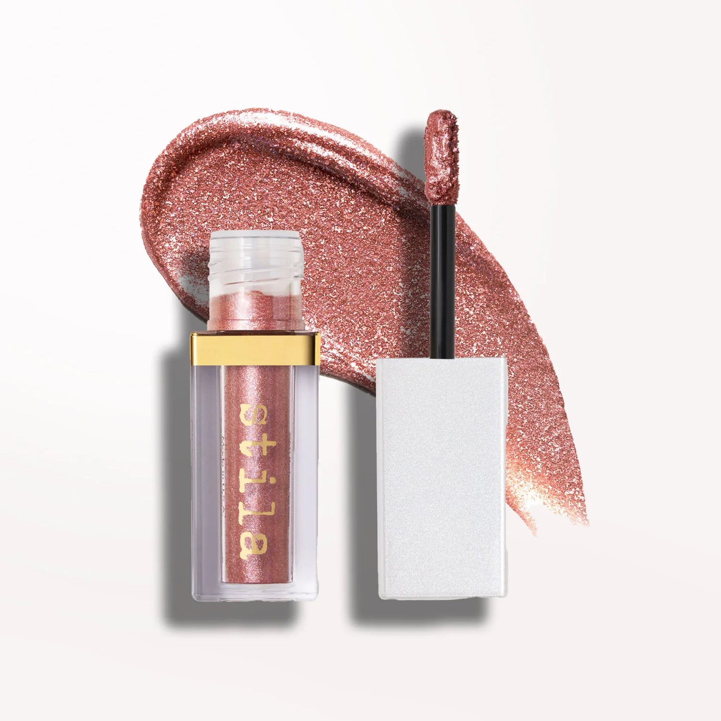 GLISTEN & GLOW LIQUID EYE SHADOW-Rio - Soft pink glitter