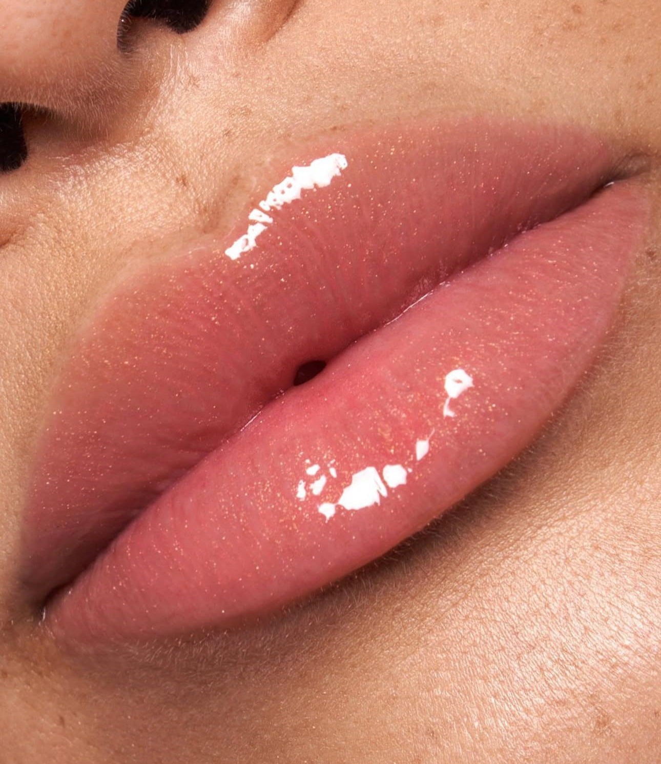 Forget The Filler Lip-Plumping Line-Smoothing Gloss-Cali sunset ( medium brown with golden shimmer )