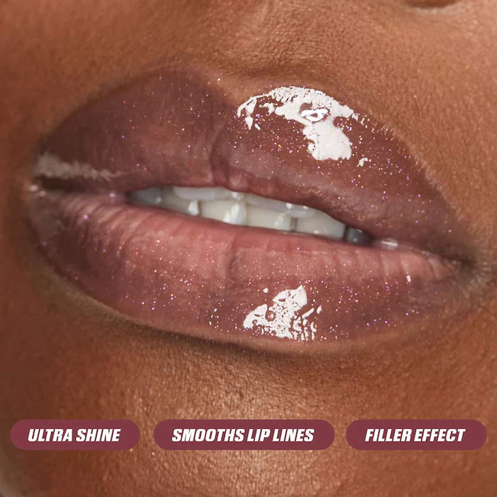 Faux Filler Shiny Non-Sticky Lip Gloss- She Glitzy - sheer clear iridescent gloss ( NEW )