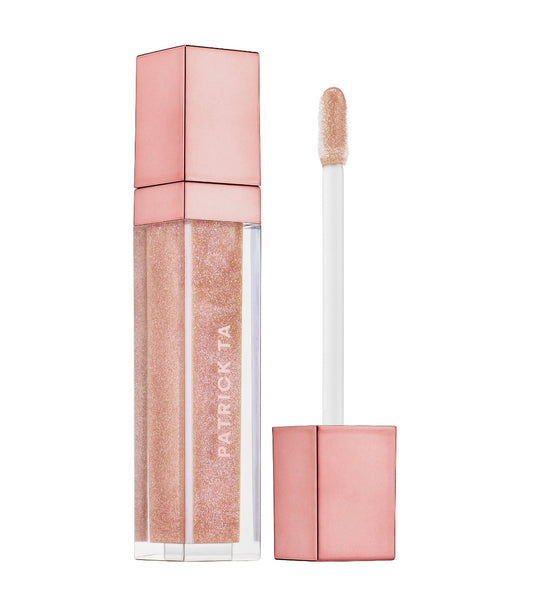 Major glow lip shine in ' She's expensive '
