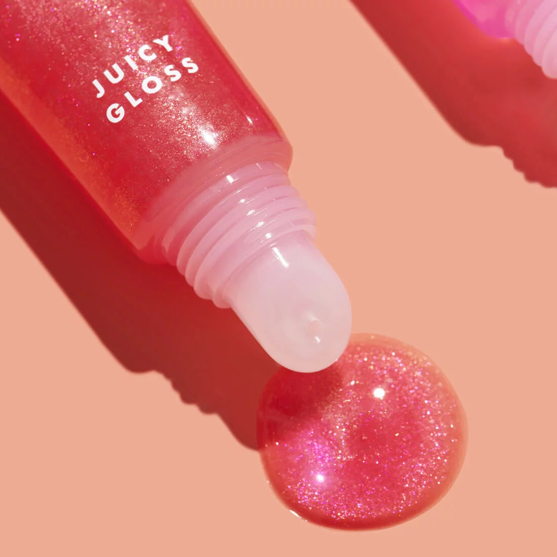 Juicy high-shine lip gloss with Hyaluronic Acid