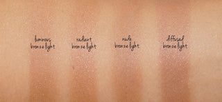 Ambient® Lighting Bronzer-Luminous Bronze Light - a medium bronze shade fused with Luminous Light for a softer, candlelit warmth. (Ideal for light/medium complexions)